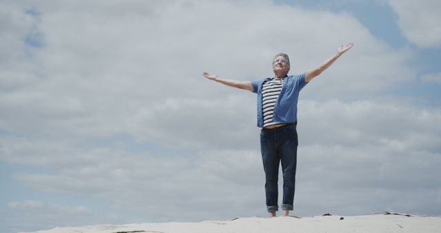 Happy Senior Man Standing on Beach with Open Arms - Download Free Stock Images Pikwizard.com