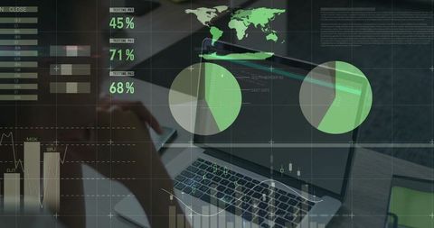 Businesswoman analyzing data with charts and laptop in modern workspace