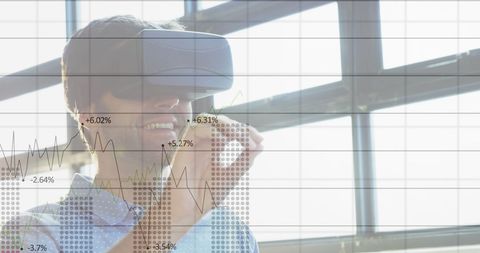 Businessman Using VR Headset Interacts with Financial Data - Download Free Stock Images Pikwizard.com