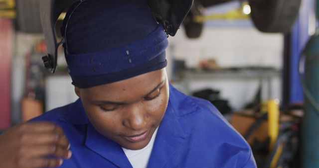 Female Auto Mechanic in Workshop Wearing Protective Gear - Download Free Stock Images Pikwizard.com