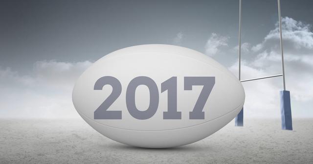 Rugby Ball with 2017 Text and Goal Posts in Cloudy Outdoors - Download Free Stock Images Pikwizard.com