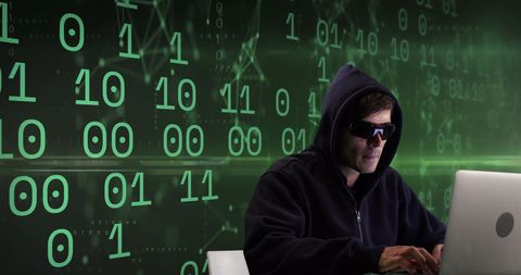 hacker typing on laptop with binary code background - Download Free Stock Images Pikwizard.com