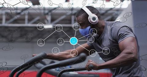 Man Working Out in Gym with Digital Fitness Data Overlay