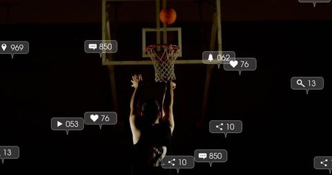 Silhouetted basketball player jumping dunk under spotlight surrounded social alerts