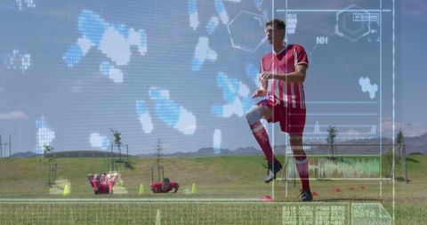 Soccer Player Practicing on Field with Futuristic Interface Graphic