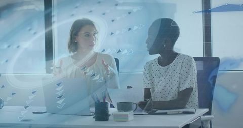 Collaborative Teamwork Between Professional Women in Modern Office