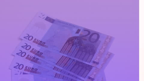Stack of Euro Bills on Soft Purple Background