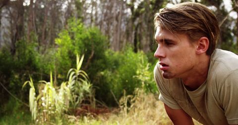 Young Man Exploring Wilderness with Determined Focus - Download Free Stock Images Pikwizard.com