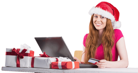 Festive Redhead Woman Shopping Online with Santa Hat and Gifts