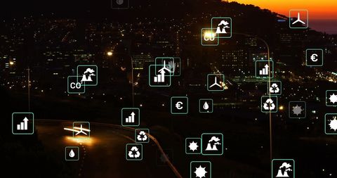Sustainable City with Eco Icons and Roadway at Dusk - Download Free Stock Images Pikwizard.com