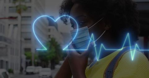 Woman Adjusting Face Mask with Health ECG Overlay in Urban Street