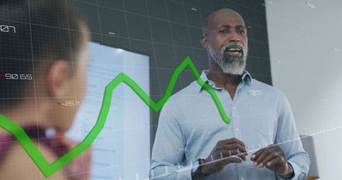 Business Leader Illustrating Market Trends at Interactive Meeting