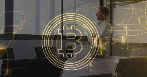 Businessman in Office with Bitcoin Symbol Overlay