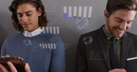 Smiling business professionals using smartphones with digital financial data overlay