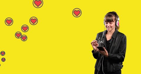 Young Woman Enjoying Music with Smartphone and Headphones