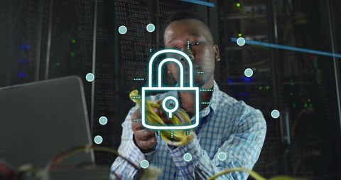 Network technician organizing server cables in data center with digital padlock overlay