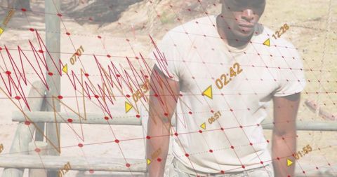 Leaning man in tan shirt and khaki pants on wooden railing with red data grid overlay