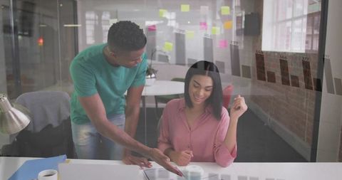 Collaborative Teamwork Session in Modern Office Environment