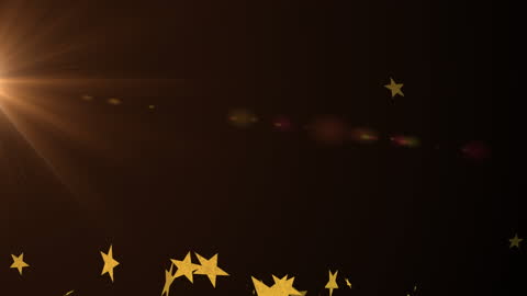 Glittering Stars with Radiant Light Trails on Black Background