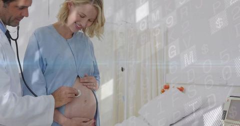 Doctor examining pregnant woman in healthcare clinic
