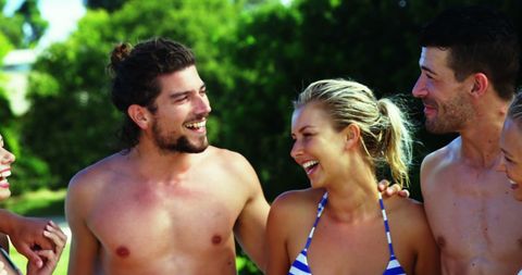 Group of Friends Laughing Outdoors on Sunny Day - Download Free Stock Images Pikwizard.com