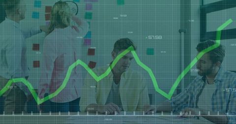 Team Brainstorming with Business Analytics Display