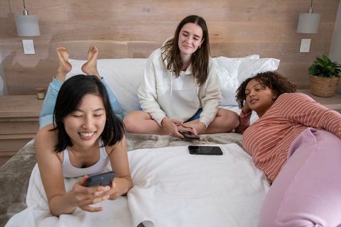 Diverse Female Friends Relaxing and Connecting Indoors