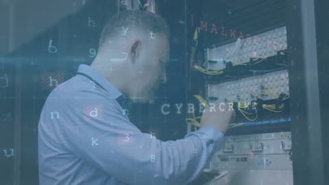 Technician Analyzing Server Rack in Data Center Environment