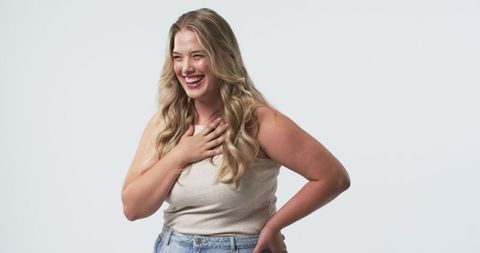 Joyful Plus Size Young Woman Laughing