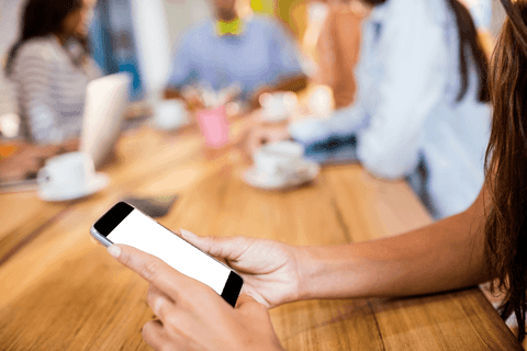 Businesswoman Using Transparent Smartphone at Workflow Meeting - Download Free Stock Videos Pikwizard.com