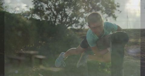 Energetic Boy Overview An Obstacle in Outdoor Field Setting