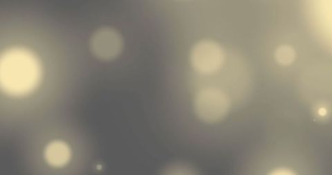 Abstract Glowing Yellow Light Spots on Grey Background - Download Free Stock Images Pikwizard.com