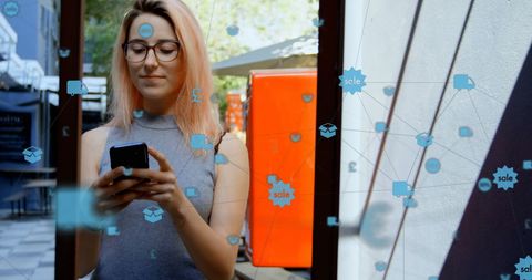 Caucasian Woman Using Smartphone Surrounded by Digital Network Icons