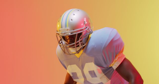 American Football Player in Colorful Lighting - Download Free Stock Images Pikwizard.com