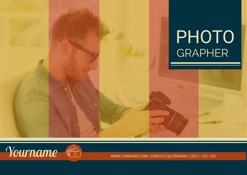 Professional Photographer Analyzing Camera in Studio - Download Free Stock Templates Pikwizard.com