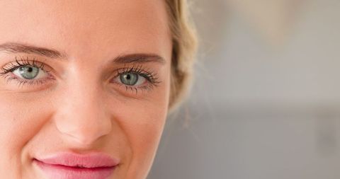 Close-Up Portrait Highlighting Striking Blue-Green Eyes