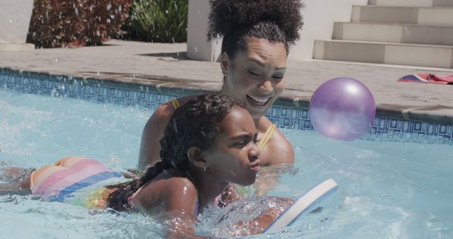 Mother Teaching Daughter to Swim in Backyard Pool - Download Free Stock Images Pikwizard.com