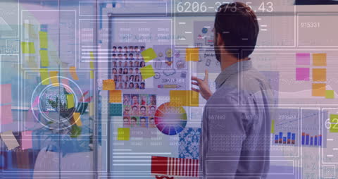 Businessman Analyzing Financial Data and Colorful Charts