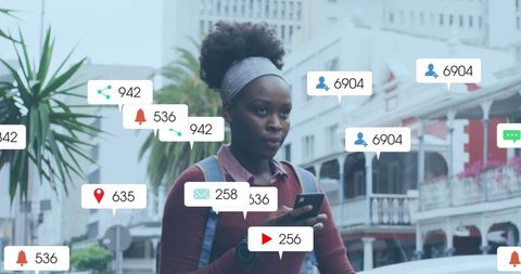 Young Woman Engaging on Social Media Through Smartphone