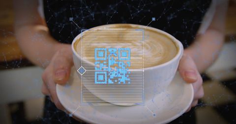 Qr code technology concept with coffee mug in cafe