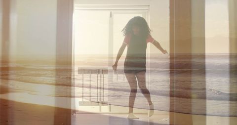 Teen Girl Dancing Freely at Home Blended with Serene Beach Scene