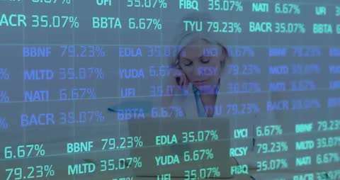 Financial Analyst Working Amidst Digital Data Display