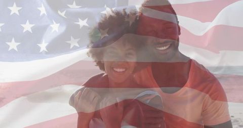 Happy Couple Hugging on Beach with American Flag Overlay
