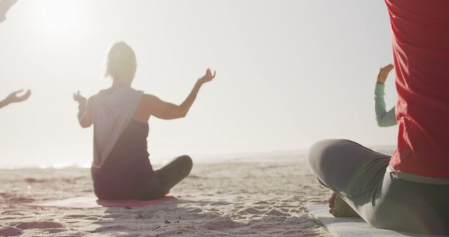 Senior Women Meditating and Doing Yoga on Beach for Active, Healthy Lifestyle - Download Free Stock Images Pikwizard.com