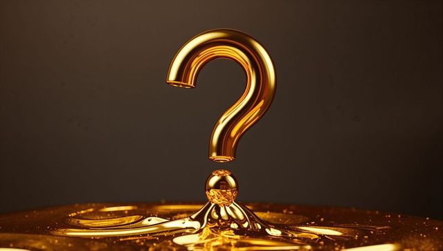 Gold question mark emerging from molten gold with ripples