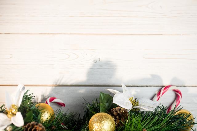 Christmas decorations on wooden plank during christmas time