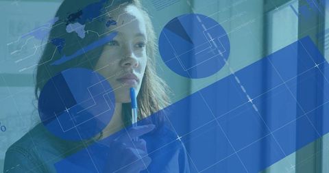 Female analyst reflecting with data visualization blue overlay