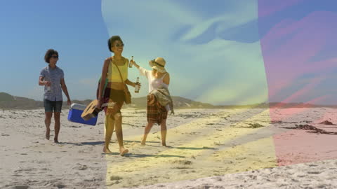 Friends Enjoying Beach Walk with Overlay of Waving Belgian Flag