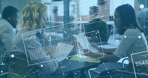 Women Collaborating with Holographic Overlays Enhancing Data Analysis