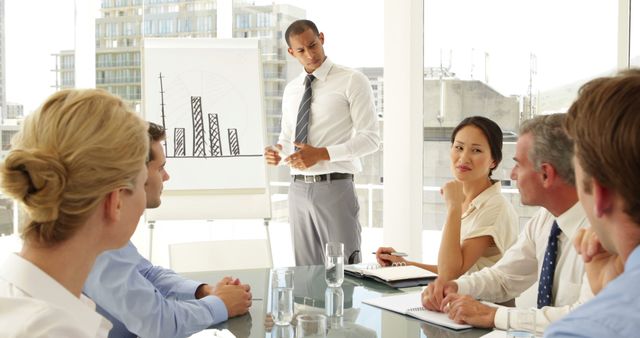 Business Presentation in Modern Office with Focused Team - Download Free Stock Images Pikwizard.com